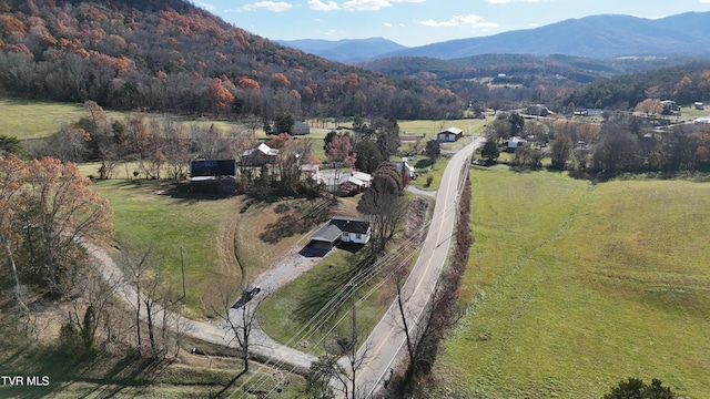 aerial view featuring a mountain view and a rural view