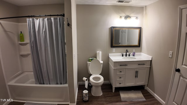 full bathroom featuring shower / bath combination with curtain, vanity, wood-type flooring, and toilet