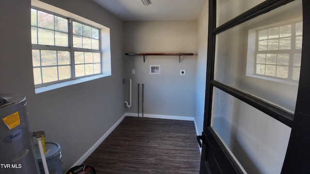 laundry room with electric dryer hookup, plenty of natural light, dark hardwood / wood-style flooring, and hookup for a washing machine