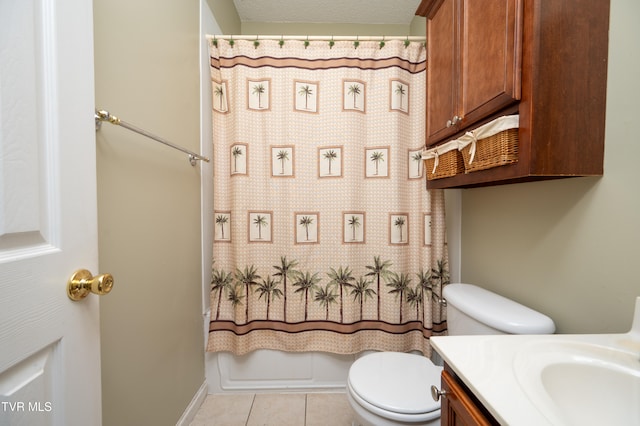 full bathroom featuring vanity, shower / bath combo, tile patterned floors, toilet, and a textured ceiling