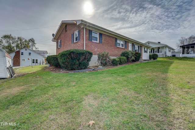 view of front of home featuring a front lawn