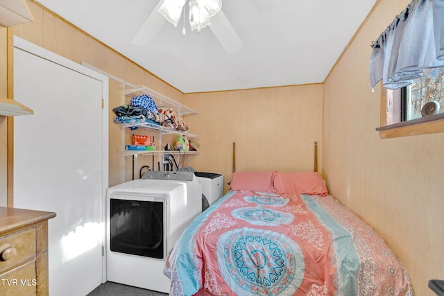 bedroom featuring ceiling fan and washing machine and dryer