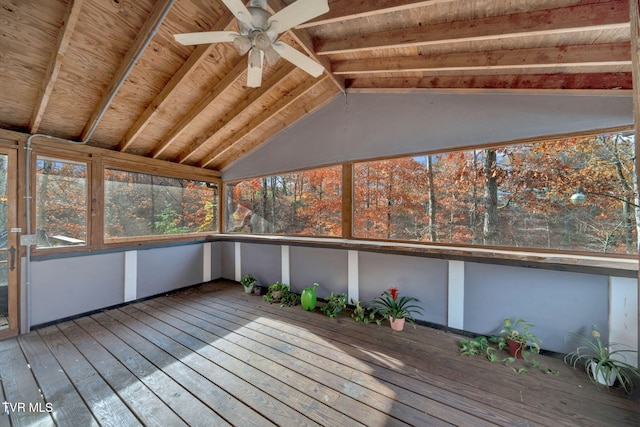 unfurnished sunroom with lofted ceiling with beams and ceiling fan