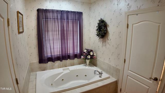 bathroom with tiled tub