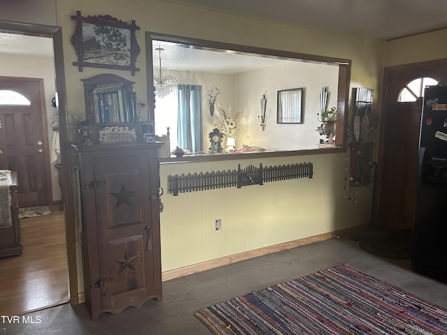 foyer entrance featuring dark wood-type flooring