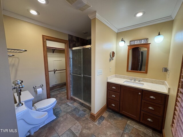 bathroom featuring vanity, a bidet, toilet, ornamental molding, and a shower with shower door