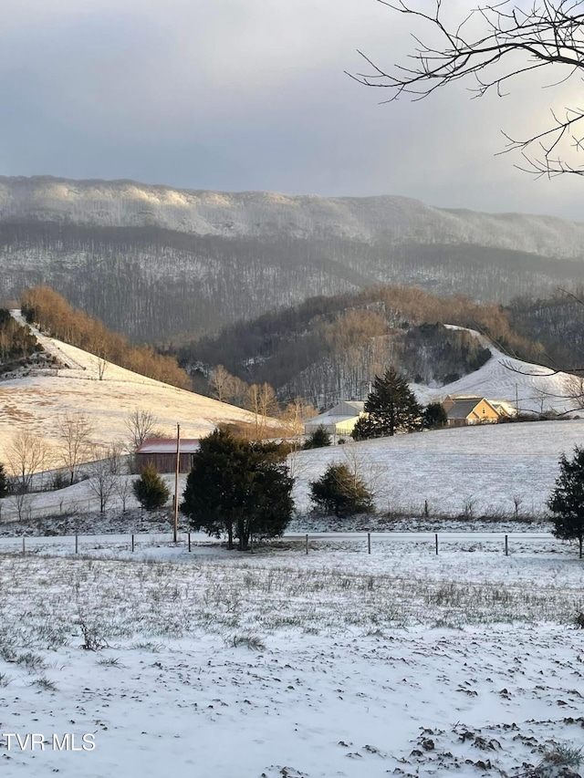 mountain view with a rural view