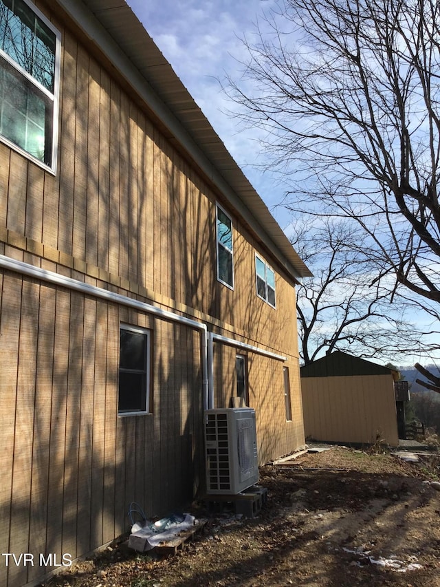 view of property exterior featuring ac unit