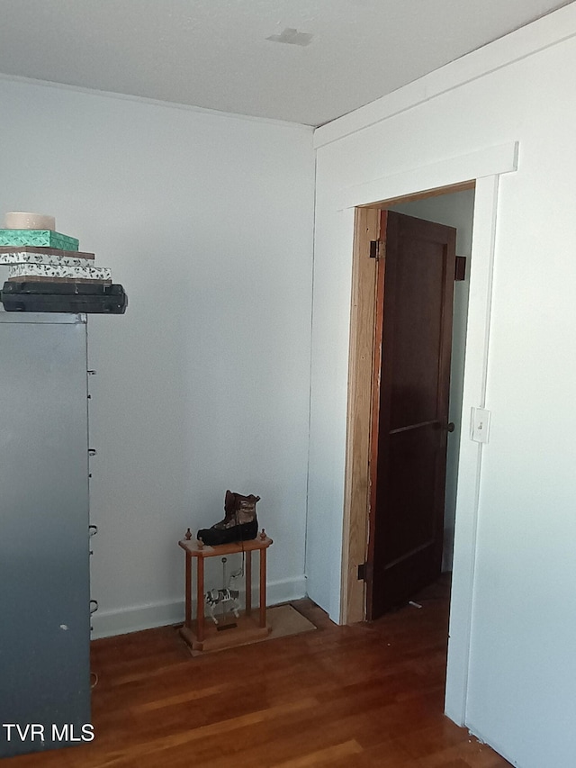 hallway featuring wood finished floors