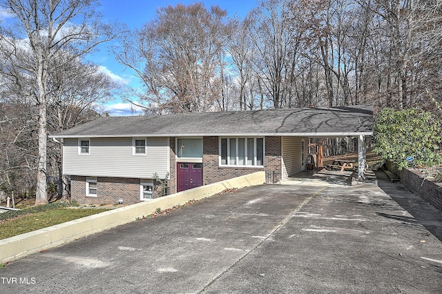 view of front of property with a carport