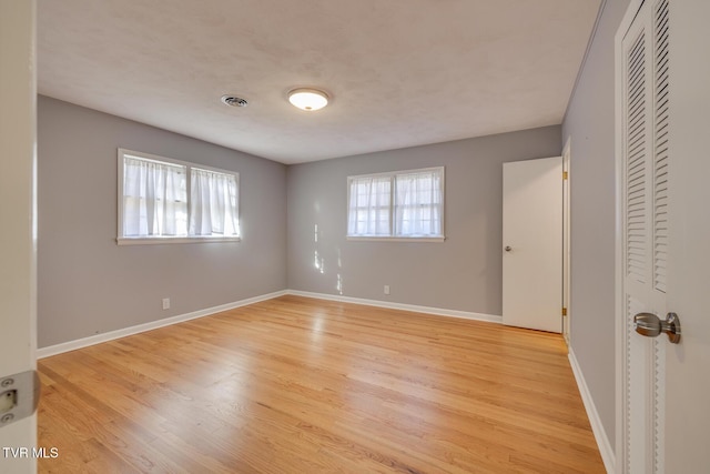 unfurnished bedroom featuring light hardwood / wood-style flooring