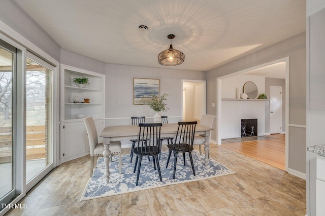 dining space with built in shelves