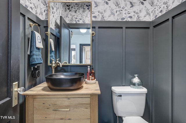 bathroom with vanity and toilet