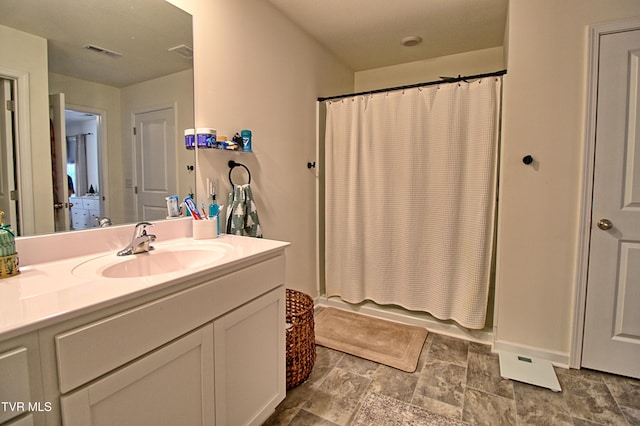 bathroom with vanity and shower / tub combo