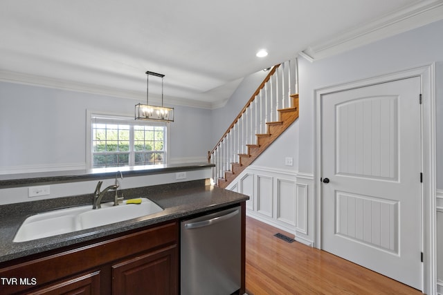 kitchen with dark brown cabinetry, crown molding, sink, and stainless steel dishwasher
