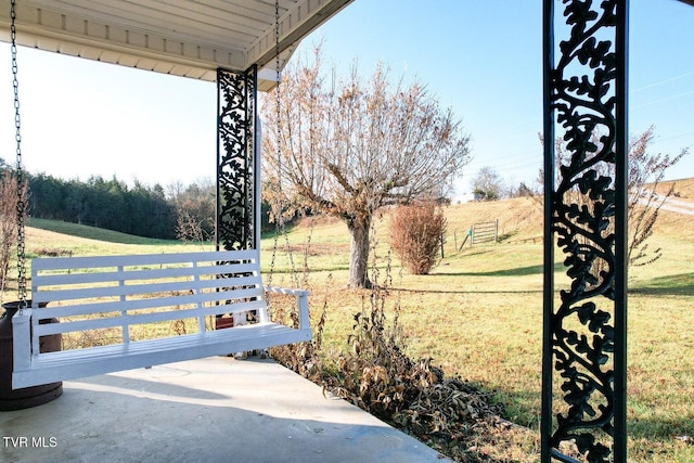 view of patio with a rural view