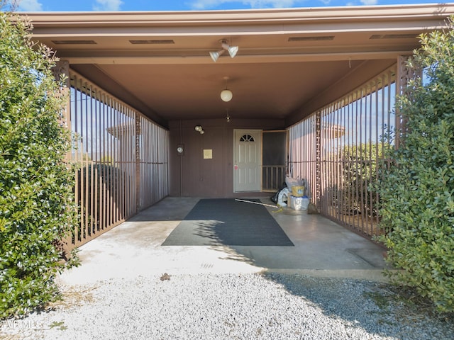 entrance to property with a carport