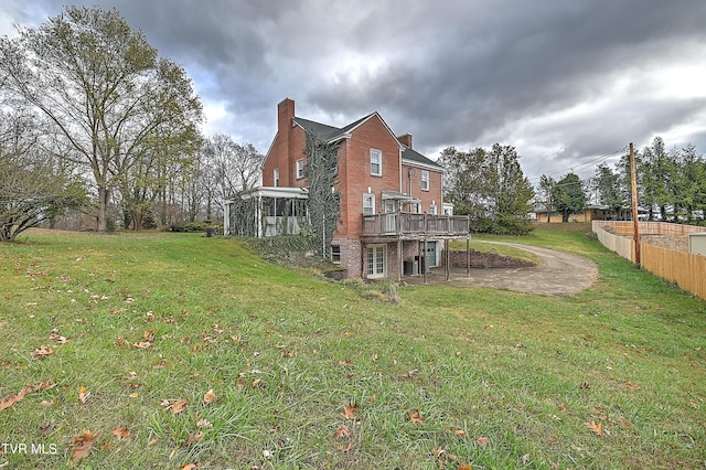 view of yard with a wooden deck