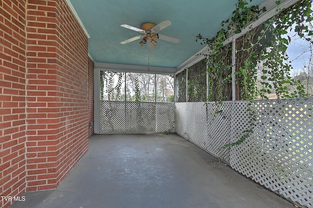 view of patio featuring ceiling fan