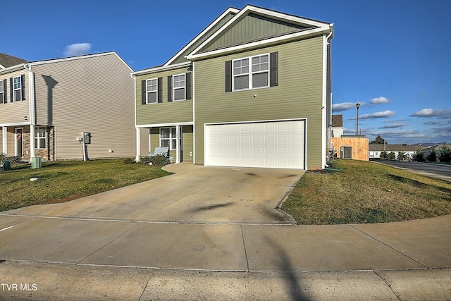 view of front of home with a garage and a front lawn