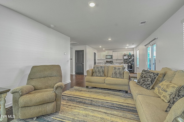 living room featuring hardwood / wood-style flooring