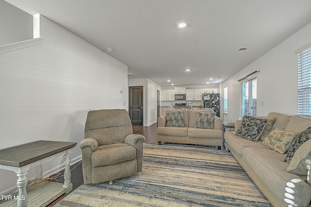 living room with wood-type flooring