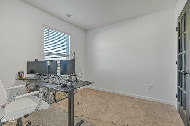 home office with light colored carpet