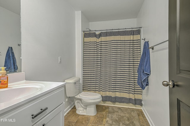 full bathroom featuring shower / bath combination with curtain, vanity, and toilet