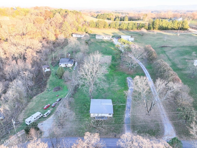 birds eye view of property featuring a rural view