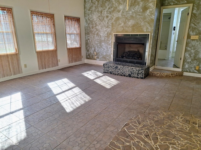 unfurnished living room featuring a fireplace