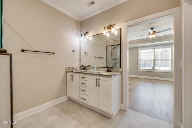 bathroom with vanity, tile patterned floors, ceiling fan, and ornamental molding