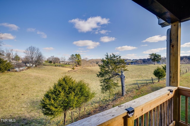 view of yard with a rural view