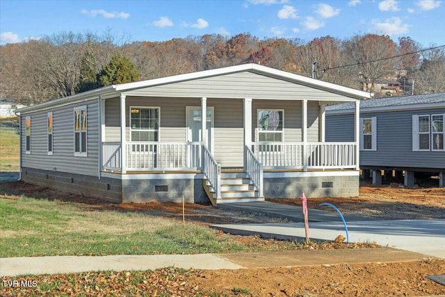 view of front of property featuring covered porch