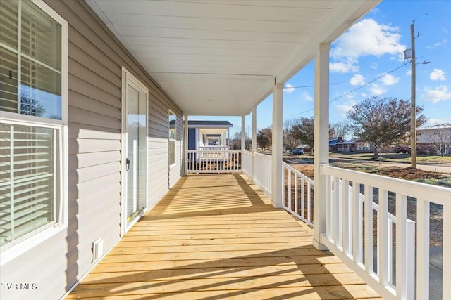 balcony featuring covered porch