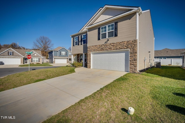 view of front of house with a garage, a front lawn, and cooling unit