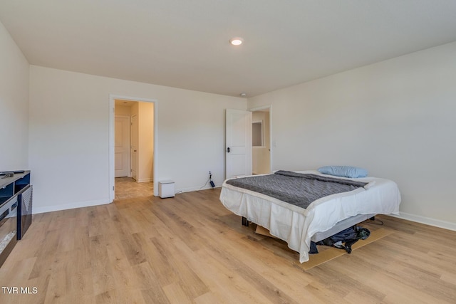 bedroom featuring light hardwood / wood-style flooring