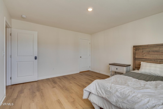 bedroom featuring light wood-type flooring