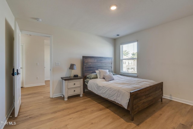 bedroom featuring light wood-type flooring