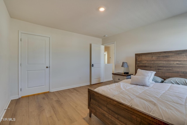 bedroom featuring light hardwood / wood-style flooring