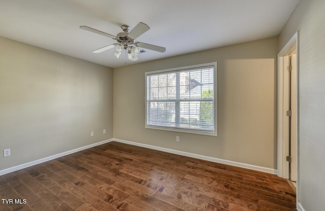 1505 Kensington Pl Unit 1505, Johnson City, TN 37615 - empty room with dark wood-style flooring, baseboards, and ceiling fan
