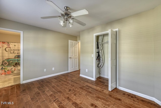 1505 Kensington Pl Unit 1505, Johnson City, TN 37615 - unfurnished bedroom featuring dark wood-style flooring, baseboards, a closet, and ensuite bathroom