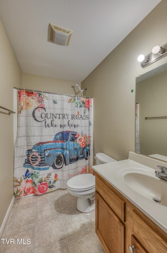 1505 Kensington Pl Unit 1505, Johnson City, TN 37615 - bathroom with toilet, vanity, and a shower with curtain