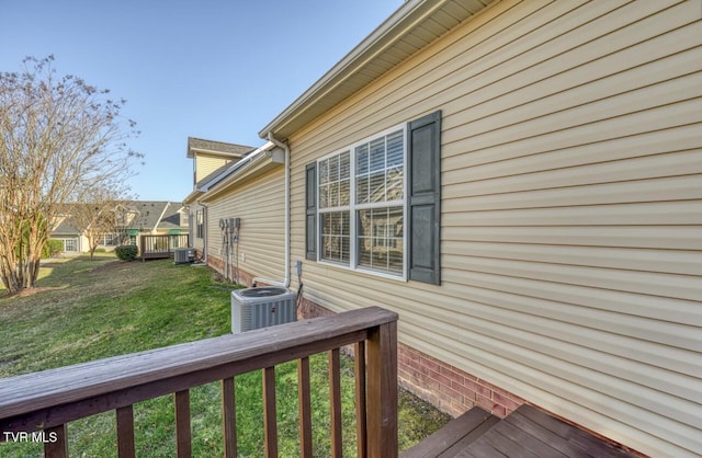1505 Kensington Pl Unit 1505, Johnson City, TN 37615 - view of side of property with a yard, a deck, and central air condition unit
