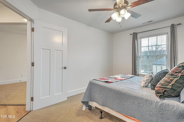 bedroom featuring ceiling fan and light hardwood / wood-style flooring