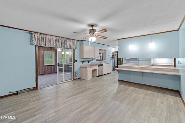 kitchen featuring crown molding, pendant lighting, light hardwood / wood-style flooring, dishwasher, and white cabinetry