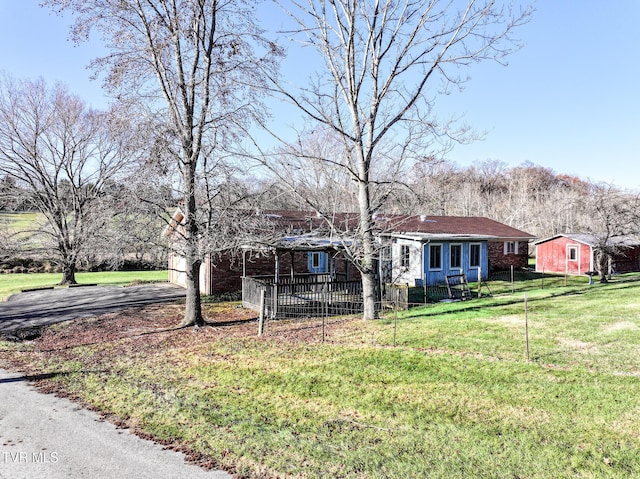 exterior space featuring a front yard