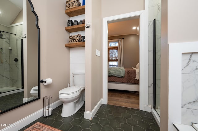 bathroom with tile patterned floors, vaulted ceiling, toilet, a shower with shower door, and ornamental molding