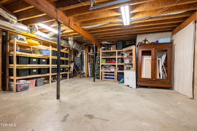 basement featuring water heater