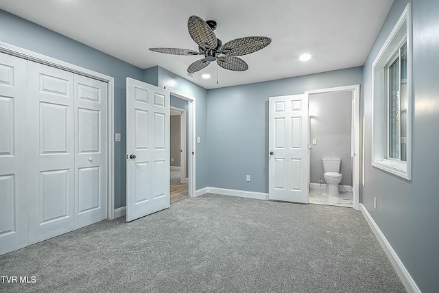 unfurnished bedroom with carpet, baseboards, ensuite bath, recessed lighting, and a closet