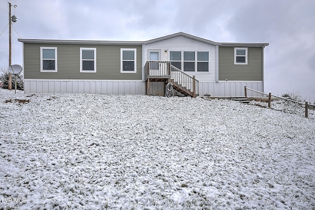 view of snow covered property